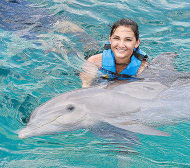 Swim with dolphins in Garrafon Park, Cancun, Isla Mujeres